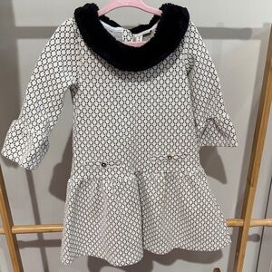 Chic Black and White Patterned Dress with faux fur collar and flared sleeves